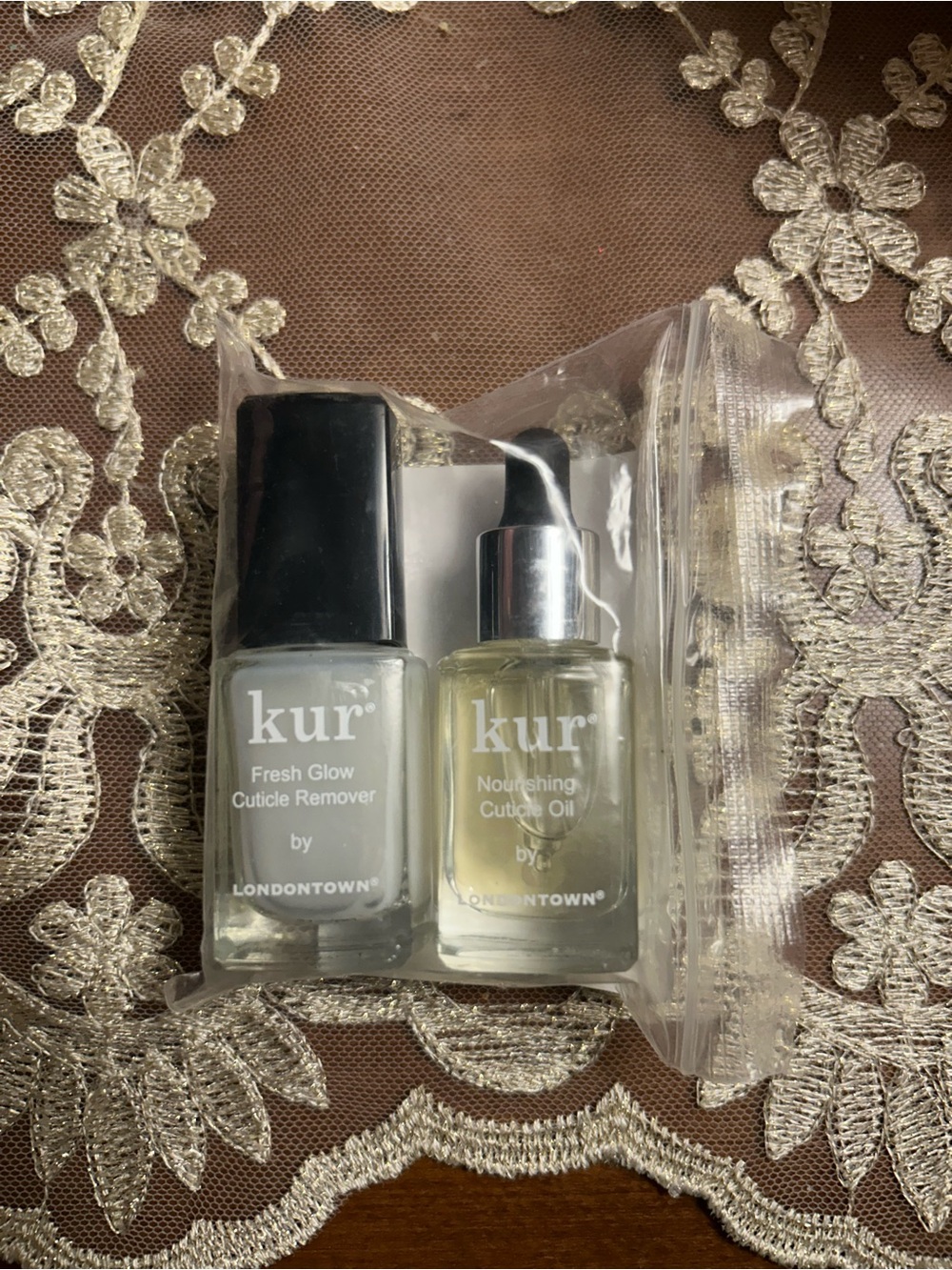 Kur nail care with cuticle oil. New and still in bag.